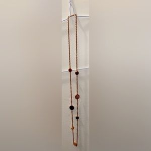 Necklace with charms which are beaded
